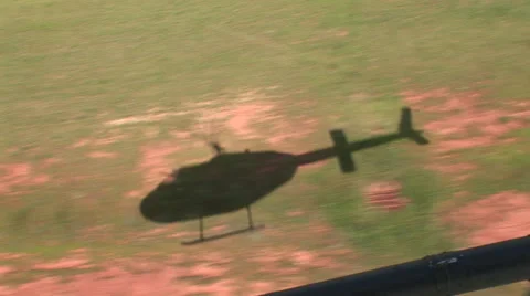 Helicopter shadow as it lands Stock Footage 41653549