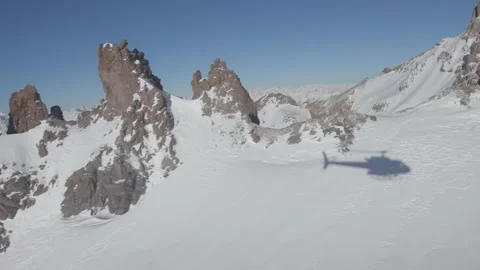 Helicopter Shadow Snow Covered Mountain Stock Footage 165624341