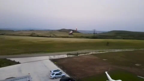 Helicopter shooting from a drone 스톡 동영상 228643352