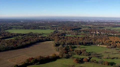 Helicopter shot of countryside looking almost directly down. Small hamlets Stock Footage 61908317