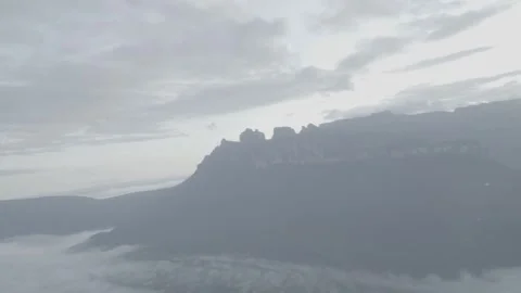 Helicopter shot at magic hour flying through a jungle valley in Venezuela  库存影片 248709116