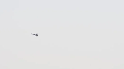 Helicopter (small in frame) Stock Footage 37632101