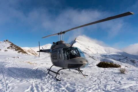 Helicopter on the snow Stock Photos
