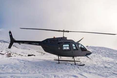 Helicopter on the snow Stock Photos