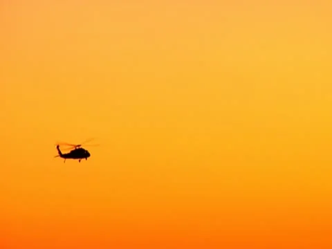 Helicopter at sunset Stock Footage 10562576