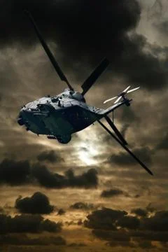 Helicopter at sunset Stock Photos