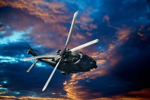 Helicopter at sunset Stock Photos