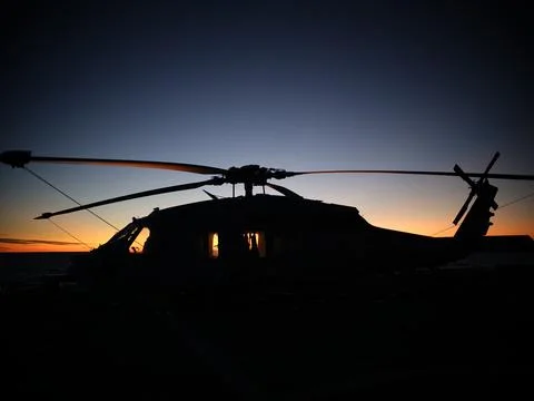 Helicopter at Sunset Stock Photos