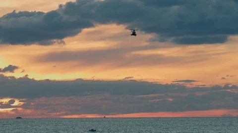 Helicopter sunset sea Vídeos de archivo 87232692