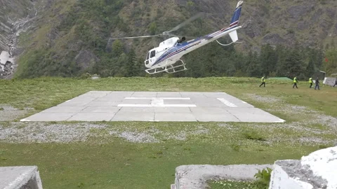 Helicopter take off from ghangaria Stock Footage 196551821