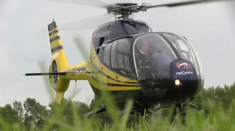 Helicopter take off, low angle Stock Footage 24947919