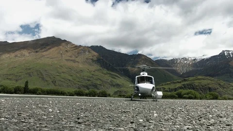 Helicopter Take-Off on Riverbed Stock Footage 82680412