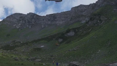 Helicopter takeoff in the mountains Stock Footage 124856909