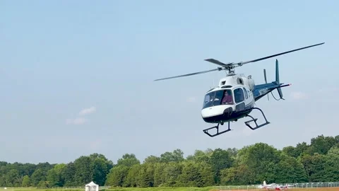 A helicopter takes off Stock Footage 158130337