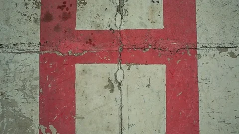 The helicopter takes off vertically from the helipad. The camera looks down. Video stock 72690051