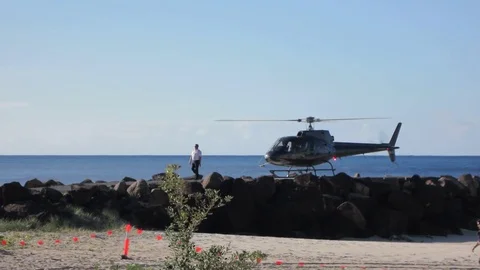 Helicopter taking off at the beach Stock Footage