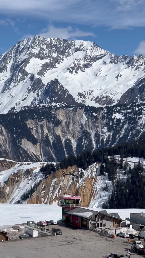 Helicopter taking off in Courchevel ski resort airport by winter Stock Footage 337072847