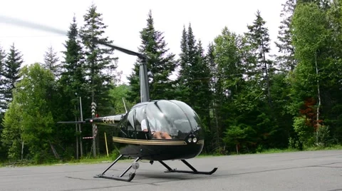 Helicopter taking off in forest Stock Footage 61083938
