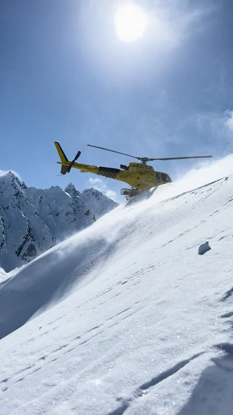 HELICOPTER TAKING OFF FROM MOUNTAIN Stock Footage 249112016