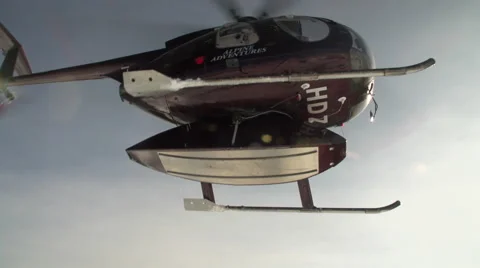 Helicopter taking off snowy mountain side in New Zealand's Alps. Stock Footage 45119047