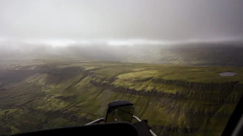 Helicopter Tour Above Steep Cliffs and Plateau in Iceland Stock Footage 322099784