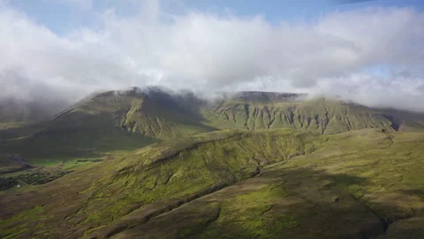 Helicopter View of Icelandic Highlands with Clouds and Peaks Stock Footage 319699403