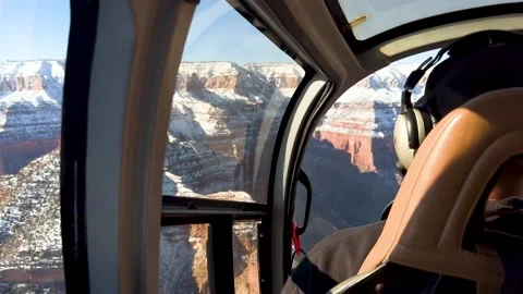 Helicopter View Over the Rugged Terrain of the Grand Canyon Stock Footage 282385731