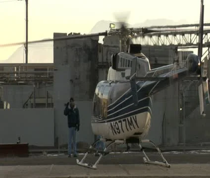 Helicopter warms up to takeoff Stock Footage 21526843