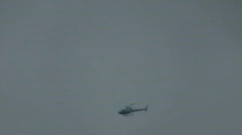 Helicopter zooms by Stock Footage 694731