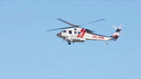 Helicopters are Responding to the Malibu Fire in Los Angeles, Year 2025 Stock Footage 297712679