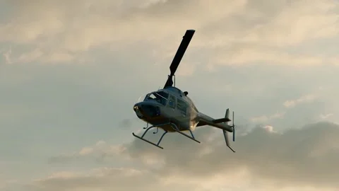 Helicopters flying across the sky Stockbeeldmateriaal 316512609