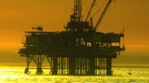 Helicoptor Flying from Oil Rig Stock Footage