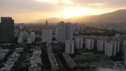 Helishot of the city Tehran during Sunset Stock Footage 335875152