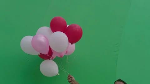 Helium Balloon On A Green Screen Background. Stock Footage 167915742