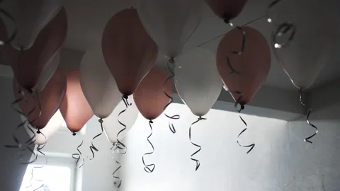 Helium layers hang under the sweat in the entrance. The layers are inflated with Stock Footage 198679019