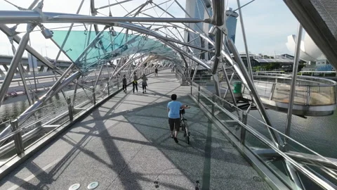 Helix bridge high angle walk people dolly move forward Stock Footage 170271625