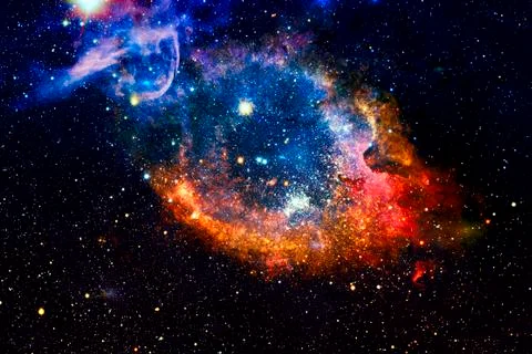 The Helix Nebula in deep space. Stock Photos