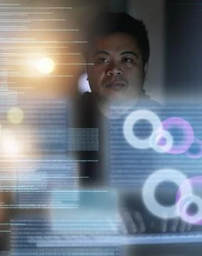 Hell make it through any system. Shot of a hacker cracking a computer code in Stock Photos