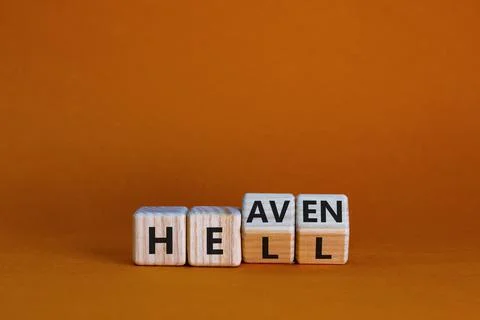 Hell or heaven symbol. Turned wooden cubes and changed the word 'hell' to 'he Stock Photos