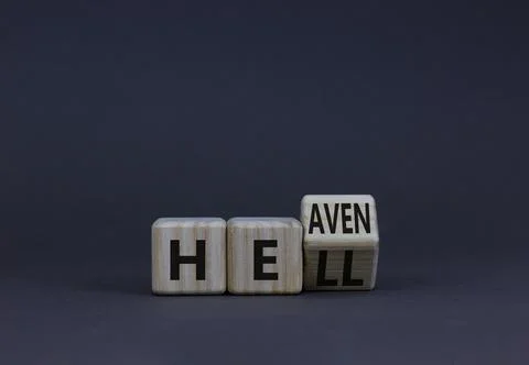 Hell or heaven symbol. Turned a wooden cube and changed the concept word Hell Stock Photos