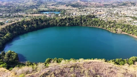 Hell Ville and the nearest volcanic lakes Lac Ampombilava and Djabala, Nosy be Stock Footage 325650758