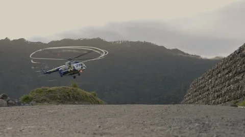 Hellicopter is about to land in the jungle Stock Footage 121664930