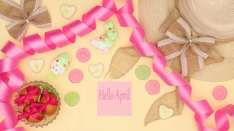 Hello April title appear with Easter and spring decoration - Stop motion Stock Footage 122054781
