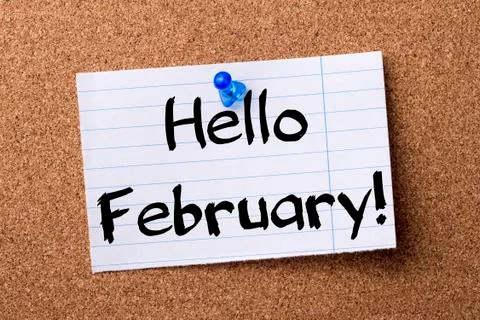 Hello February! - teared note paper  pinned on bulletin board Stock Photos