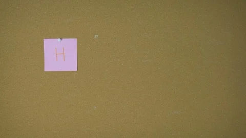 Hello. Hands pining sticky notes on pin board funny animation Stock Footage 98524864