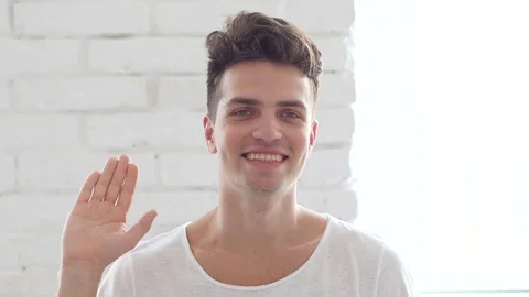 Hello, Handsome Man Waving Hand Stock Footage 75556260