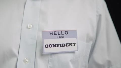 Hello I am Confident name tag.Closeup confident name tag on shirt 스톡 동영상 329325899