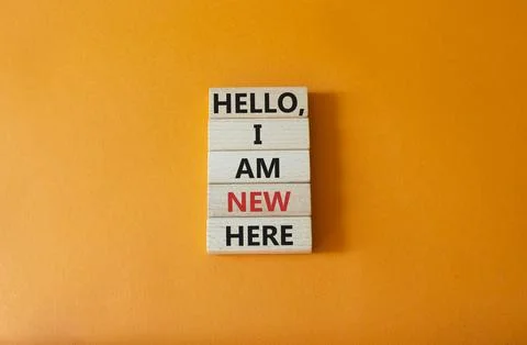 Hello I am new here symbol. Concept words Hello I am new here on wooden blo.. Stock Photos