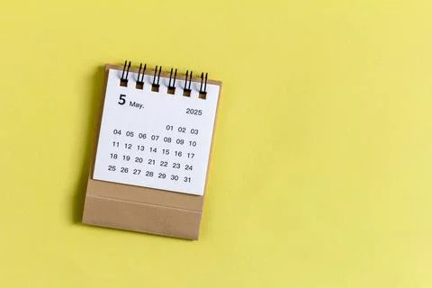 Hello, May. The planning calendar for May 2025 is on your desktop. Stock Photos