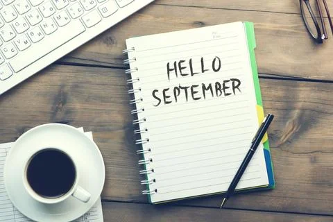 Hello september text on notepad Stock Photos